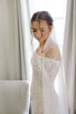 I wanted a simple look and this was the perfect look. I did end up getting some alterations in the sleeves and the bust but it wasn't that much! - Hannah D.