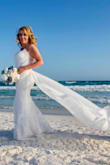 I absolutely loved this dress. I had to size up for the dress as it tends to run small. The material and workmanship were very nice. My wedding was on the beach and the train was absolutely beautiful flying in the wind next to the ocean. Could not have been happier with my dress. - Audrey B.