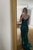 This dress was stunning; the color, the fabric, and the way the straps cross on the back! I'm absolutely in love with this dress! - Lydia S.