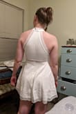 My fiance loved this dress (and I did too). It felt well made I loved the high neck and the lace details. It's a little on the short side, I would have loved another inch or two of length. That being said it's comfy and cute. I'm using it as my dance party dress for our wedding. - Katie W.