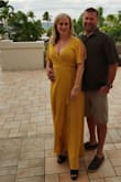 Yellow is my color and this dress did not disappoint. Super sexy slit with plunging neckline. I wore a deep cut bra and fashion tape...no worries! Super comfortable. Overlap of material was sufficient to sit or walk without showing too much. Wore this with about 3 inch heels. - Melissa T.