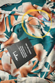 It's a really beautiful jumpsuit that fits perfectly until I noticed it was coming apart at the seams. I just wanted to cry I purchased this for a party that I need to wear some sort of green to. Check it very well before you remove the tag! - Makeba B.