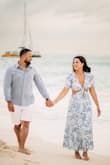 I wore this dress on our vacation (for our engagement little did I know) and it was absolutely perfect! I'm usually between a small and a medium, ordered a medium because I have a larger chest and it was definitely the right size! Slightly lose in the hips but thats typical for clothes on me. Stands out in vacation pics and I got lots of compliments! - Kelley W.