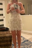 This dress is really pretty and could be dressed up or down depending on the occasion. I ordered Medium which is my typical size and it fits quite perfectly. Fabric is a little stretchy which is good for maneuvering - it fits me snug - without feeling or looking tight. I chose this for my wedding anniversary but will wear it all summer for evenings out! I looked at all reviews thoroughly before committing to buy, and I wouldn't hesitate to recommend it. - Sarah D.