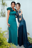 Dress looks just like on website, it is a stretchy and flattering material. It is very elegant and wraps body nicely. It is a good length to wear with high heels. I was very pleased with my purchase. It is a very classic style, I will wear it again to another event. - Jennifer B.