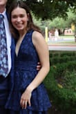 I loved this dress!!! Was very flattering and the fabric quality was unreal. I did safety pin the front because it went a little further down than I was comfortable with, but the pin worked great!! I couldn't recommend this dress enough. - Lauren D.