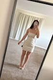 This dress fit really perfectly in the front and wasn't too short in the back. It's a really thick but stretchy material, and it feels very good quality. The only problem was at my lower back it needs to be taken in about 2 inches, but that's to be expected with my proportions and I am going to have it taken in. I have wider hips, so I go between small and medium in other brands, but I always get a size small from Lulus. - Hannah L.