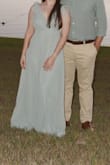 The dress is beautiful, however, I'm very short, and I had to have the straps tailored because they were way too loose. It's also VERY long, which is a good thing for tall people, me? Not so much. I'm usually a S, but ordered XS. The fit was good except for those two things - Jennifer F.