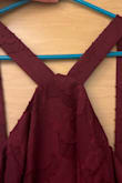 I bought this dress as my maid-of-honor dress and I really love it so much! My one issue is that the halter top is sewn to the top of the dress unevenly. One side is slightly higher than the other and it bothers me a bit.

Update: the staff at Lulus quickly responded and offered me a discount because of the issue. So thanks Lulus I'm a big fan of y'all! - Avery V.