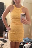 I was worried the neckline wouldn't suit me, but it was perfect! The dress is gorgeous and fits great. The yellow really pops too, but in a soft kind of way. - Vivianne C.