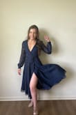 after buying this dress, I fell in love with wrap dresses. I will say, you will have to sit up straight consistently in this dress because it is revealing - Allyssa T.