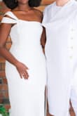 Normally wear a size 4 or 6, tried the small on but it was too tight fitting due to my wife hips, but fit so perfectly at my bust. I have a pear shaped body. 
Since this was for a wedding and I wanted to look elegant, I went with the medium size which still hugged nicely but wasn't too tight that you tell every inch of my hips. I had to get the bust area slightly altered to feel like it wouldn't gap since I only wore nipple covers inside the dress.
Felt gorgeous in the dress, great design. 
I will add, the slit rides a bit far up while sitting, which felt awkward and I had to be careful how I sat.

MATTEQUARTZ9923SG - Blessing A.