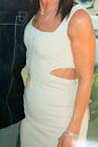 Purchased this dress for an awards dinner it was an off white dress that was very form fitting. It was a great fit and I loved the look. - Stacy D.