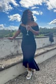 This dress was perfect for a "sneaker" wedding! It is very comfortable and easy to move around in. Loved the fit! - Ivory W.