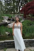 Absolutely in love with this dress for my micro wedding! I got so many compliments. It fits like a dream. I only needed to get it hemmed. I did have an extra pin added to the back to make it fit more, it does sag a bit. It rained on my wedding day and this dress held up well. No stains or anything. - Harley S.