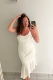 Wore this for a nice dinner out during my Bachelorette. Fit beautifully, love the asymmetrical bottom. Got SO many compliments. Lightweight, fits true to size. Did come with a small stain but I think I was the only one who noticed it. - Connor B.