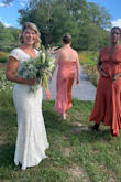 I had to have the dress tailored to fit me perfectly but honestly not much. It was light enough for a Summer wedding but still had some structure and shape to it. I love this dress and I felt so comfortable and beautiful on wedding day!

It looks elegant and lacy but it fits like a dress you could wear out dancing. PERFECT. - Deborah S.