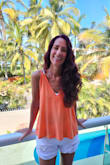 I purchased this tank because 1, it was a good deal on sale and 2, would be perfect for my Mexico trip. Great lightweight material and very cute. I'm not one to go braless and it could work with just the right bra but I decided to pair it with a sports bra and was super comfortable. - Aimee C.