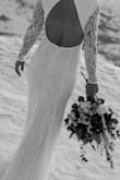 I couldn't believe how good the quality was and how perfect the fit was, I was not expecting such an incredible wedding dress and I'm so glad it turned out so well! - Caylee D.
