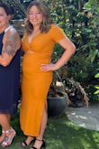 The color is beautiful, but I felt like it accentuated my belly a bit more than expected. Its a bit tight and It's also very long, it's supposed to be midi length, but on someone short like me it's to your feet. The top section is very cute. - Renatta M.
