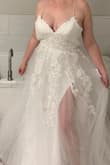 Gorgeous, poofy Princess like dress. My chest was hanging out of the top, but I am all for cleavage so it would have worked. It was too big (poofy) to pack for my destination & it was way too long. I wasn't wanting to make alterations. - Stacy S.