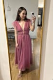 I love this dress! Looks more expensive than it is. It is longer on me than the model which I like. I like how the color is more muted in person as well. Just needs a light steaming to get some wrinkles out. Can't wait to wear it to the wedding I have coming up! - Felicia D.