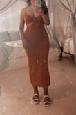 Absolutely love this dress. Fits perfectly and looks so beautiful on. I am 36C cup and dress hold them well. As seen in the picture, fabric is light but sweater-like, so on a hot day you may sweat a little bit. So worth it though. - Paulina A.