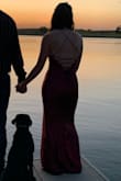 The dress was amazing!! Wore it for prom, it fit to the true size I needed. The only thing I would say is your probably going to want to sew in more threat to where the straps hold the dress up at the top because one of my straps broke the first time I tried putting it on. - Payton B.
