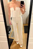 I LOVED this. It's so comfy and fit great and I and wanted it to work for my wedding luncheon, but the top just wouldn't stay up at all because of the wire V, so I had to return it. So disappointed. For reference, I tried a similar strapless jumpsuit from Lulus (without the V) and it stayed up perfectly. - Tessa L.