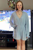 I originally bought it for myself and it was a tad bit too loose, the arms are very loose, but flowy and lightweight for summer days, however, my daughter loves it so much that she wanted it and kept it. Now she's on Lulus page all the time. - Nicole M.