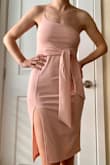 I got this for an upcoming wedding, and I think it will work great, it looks really nice on. The length and the height of the slit work really well. This fits true to the Lulus sizing chart, so definitely consult that. In other brands I am sometimes a size S, sometimes M. Jeans size 4-6. I got the M and it fits well. I think I will definitely need dress tape to keep it up on the strapless side. The color is really nice for spring/summer! - Abi C.