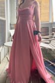 I ordered this dress with a few others to find a bridesmaid dress for a friend's wedding. This dress fits so nicely! The ability to lace up the back means that it has a good amount of leeway when it comes to the fit. There wasn't any weird gapping in the chest or any other areas. I also appreciated the placement of the skirt slit, it hits at a good spot and doesn't start too high up. I ordered it in both the pink and the yellow, but the yellow didn't match my skin tone as well as the pink. - Kailey M.