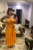This dress is very flattering. Especially on the top. Super flowy and perfect for a beach day. - Casey B.