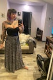 I love this skirt but it is much cuter on the model because it made me think the slit was up that high when really you have to unbutton some of the buttons to get it that high. Also, it's heavy so it will basically never show the skit open - Casey B.
