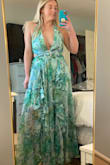 I am super pleased with the fit of this dress, the quality, and really overall happy with it. Wearing it to a wedding this summer and can't wait. Noticed someone saying the fit was off in previous reviews but I actually found it to be just right on me. The only thing I noticed is that the back smocked strap area has a little too much material (if I am nitpicking). Anyway, highly recommend it for the price and quality! - Molly S.