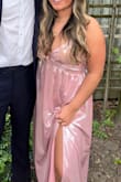 Wore to my sorority formal and got so many compliments. The material is stretchy and not rough at all. Is a little long but overall rlly cute - Caroline C.