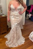 This dress is killer! The lace has wonderful 3d flowers and the details throughout are amazing. - Emily M.