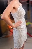 I'm usually between sizes 6 and 8 and it fits great! Just make sure to wear skin-toned underwear and you'll be good to go. It's on the shorter side so consider this a very mini dress.
I particularly received compliments on the top part of the dress since it's so unique. - Andrea M.
