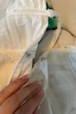 The clasp on the back of the dress is made wrong. It has two hooks, instead of one hook and one loop to hook the clasp through. I have attached a photo. I will like to exchange this for the same size. I took the tag off because I thought it was perfect until I couldn't clasp it in the back because it was made wrong. - Marley R.