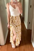 I'm obsessed! I bought this for an upcoming vacation and can't wait to wear it! I am short (5'0) so anything midi = maxi for me lol. It hits right at my ankle so doesn't drag on the ground which I'm happy about. Fits perfect. Ordered xs. - Jenn S.