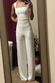Fits good and tall girl friendly, but very loose in the private area. Fits tighter in the bust area so be mindful of that. I got it taken up and it's folded in the second picture so don't mind that. - Adja B.