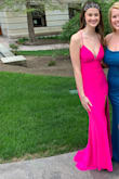 I absolutely loved this dress for my senior prom! I'm usually a size S but sized down based on the reviews, and it was the best decision. The dress looks a little darker in person but that didn't bother me. The ruching in the beck is beautiful and the dress is very stretchy and adjustable. Even for being 5'8.5, the dress was long in the back but I didn't have time to get it altered. Would definitely recommend buying if you're on the fence. - Britton W.