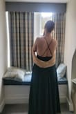 This was such a gorgeous dress and worked perfectly for a Scottish wedding at a castle. The fabric was soft and silky, but not shiny. Had a bit of texture which took some time to figure out ironing, but was ultimately very flattering. The bottom of the dress was terrifically swishy and laid in flattering folds from waist to foot. The top had enough structure to not need a bra, but was also flexible and comfortable to move in. The straps were adjustable which allows you to tighten and loosen as needed. Overall, a stunning dress and would definitely recommend! - Jordan C.