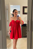 This is a beautiful dress. It is very casual and best paired with flats since it runs a little short. 
I'm usually a size small on tops but I got this dress in M, especially because I'm pregnant and my boobs have grown. 
I am used to small boobs so I was surprised at how my boobs stick out with it. Would not recommend for super busty women. 
Great option for pregnancy. - Alejandra S.
