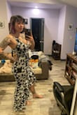 I like this one but less than I thought I would. The back side is a little loose around the waist but I couldn't size down or it wouldn't fit over my breasts. - Casey B.