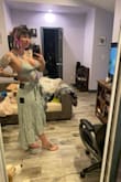 Sent me an extra small bottom and a medium top. So while if I had the right size in the skirt I would have kept the set just purely for that because the skirt is TO DIE FOR the top was the right size and like some of the other reviews I had read people are right it just doesn't fit right. It's not too tight or anything but it's very unflattering. It makes your boobs looks weird and flat. Makes your nipples appear to be droopy and low. The way the material is bunched at the bottom part of the top on both breasts just makes everything lay weird. And trust me I tried everything to make it work because I wanted it too that badly. At the end of the day the way these were made was just not right. I have other tops very similar that don't do this. - Casey B.