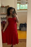 I love how this dress fits, and the color is gorgeous. It was a little tight, but nothing that was uncomfortable. I personally wouldn't size up. Overall really nice dress, I would recommend it for a cute summer occasion! - Orianna M.