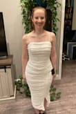I absolutely love this dress! If you're thinking of it, get it!
I mainly wanted to write this review to say please do not size down! I'm usually S in Lulus dresses but can often fit into an XS. This dress has stretchy material but the high waist is extremely fitted making it impossible to zip the XS for me. Luckily I'd ordered both sizes and the S is perfect (snug at the high waist, stretchy and fired beautifully throughout). If you're unsure of your size I'd actually pick going too big over too small.
Overall I love this dress! It's for my day after wedding brunch, and I couldn't be happier! It's flattering, super comfy, and the pearls look high end. The dress seems very well made and expensive. If you're considering it, please order it (in your regular Lulus size!) - Brea P.