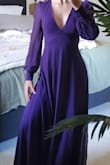 The dress is beautiful. It fits absolutely perfectly and is a great soft but sturdy material. Will be perfect for the winter wedding I'm going to! - Emily A.