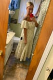 I bought this dress in an XL- it fit great but realized the top part was a little big when I sat and crossed my arms there was a gap. 
So I ordered the large and it's tighter in the front part. However, I have a lower apron belly and a smaller waist. I reeeeally dislike my arms as well. This dress hides everything I'm insecure about and perfect for a summer wedding! I am personally in between sizes so I need to either alter the XL or settle w the large. Downfall w the large is the sleeves are a tad shorter to hide my arm pudge. But I loooove it so much! Worth every penny! - Jessica S.